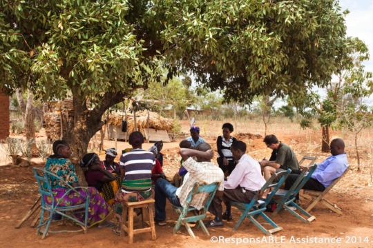 We met people in their tiny hamlets and villages and were frequently left in awe by how tidy clean all the small communities we visited were, and especially, how the Mothers built the houses for their families. Villagers talk to us while sitting under the shade of a large tree