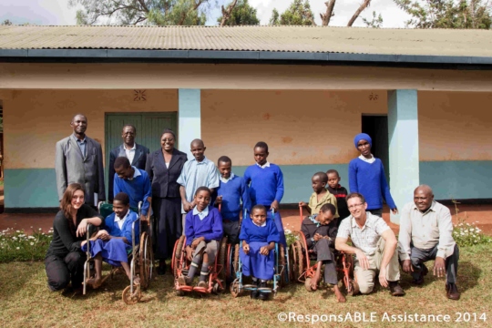 A group of disabled children who use the boarding facility at their school have their photo taken with us and their teachers in the school’s small garden