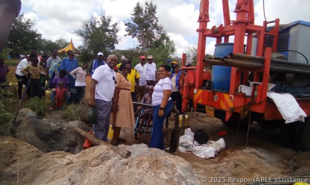 Fursa Initiative coordinator Cecilia, local community members and Kitengela Rotary Club members celebrating the drilling in Ngulu district.