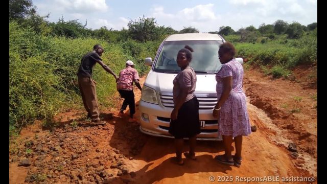 The car is too low and is now stuck in the ground. On the way to Itangini Fursa group for business skills training.